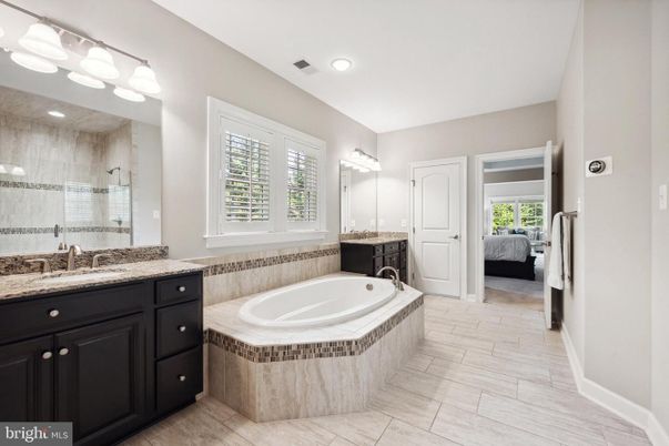Bathroom, Bedroom, Glass Shower, Interior, Recessed Lighting, Wood Texture Flooring