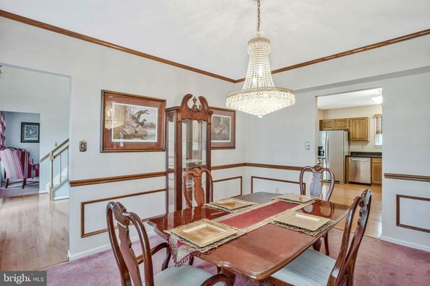 Chandelier, Dining room, Interior, Kitchen, Stainless Steel Appliances, Wood Texture Flooring