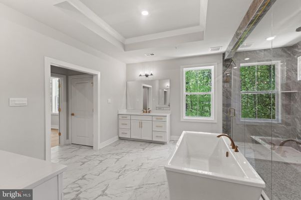 Bathroom, Dual Sink Vanities, Free Standing Baths, Glass Shower, Interior, Marble, Marble Walls, Recessed Lighting
