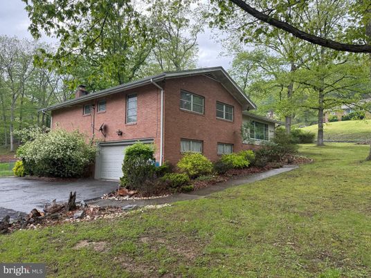 Attached, Backyard, Exterior, Facade, Brick Facade, Split Level