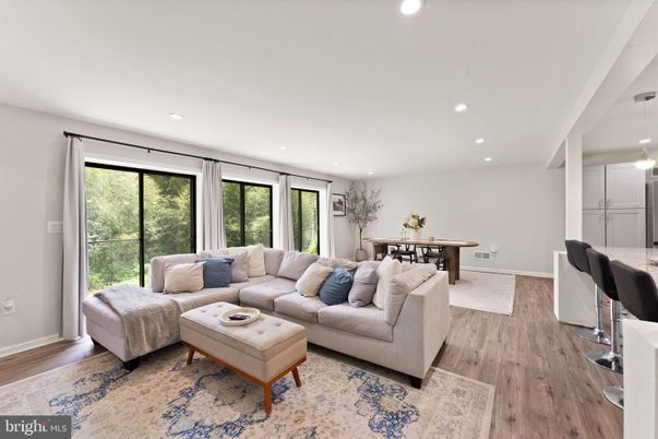 Dining room, Game Room, Interior, Living room, Pendant Lights, Recessed Lighting, Wood Texture Flooring