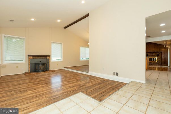 Empty room, Fireplace, Interior, Recessed Lighting, Wooden Beams, Wood Texture Flooring
