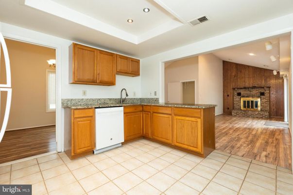 Fireplace, Interior, Kitchen, Recessed Lighting, Wood Texture Flooring