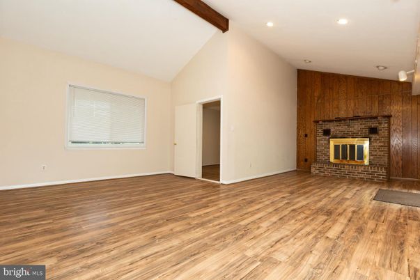 Empty room, Fireplace, Interior, Recessed Lighting, Wooden Beams, Wood Texture Flooring, Wooden Walls