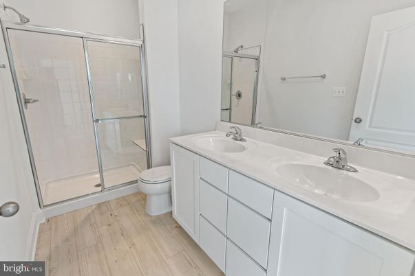 Bathroom, Dual Sink Vanities, Glass Shower, Interior, Wood Texture Flooring