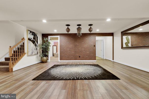 Empty room, Interior, Recessed Lighting, Stone Walls, Wood Texture Flooring