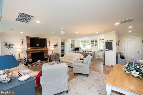 Fireplace, Interior, Kitchen, Living room, Recessed Lighting, Wood Texture Flooring