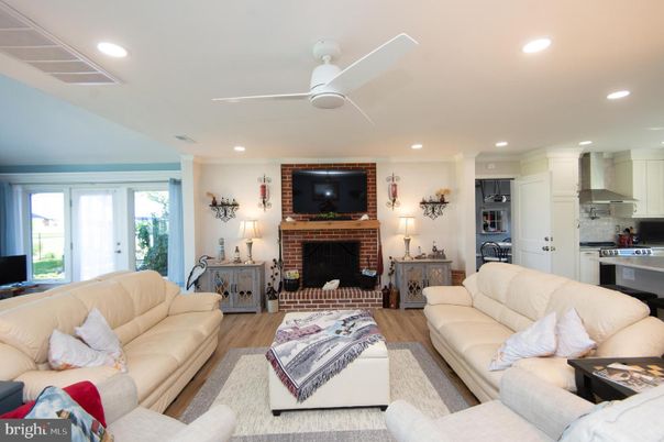 Fireplace, Interior, Kitchen, Living room, Recessed Lighting, Stainless Steel Appliances, Wood Texture Flooring