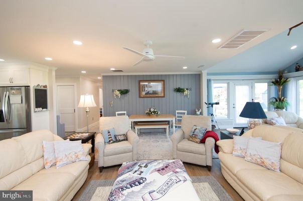 Dining room, Interior, Kitchen, Living room, Recessed Lighting, Stainless Steel Appliances, Wood Texture Flooring