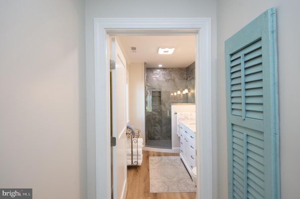 Bathroom, Interior, Marble Walls, Recessed Lighting, Wood Texture Flooring