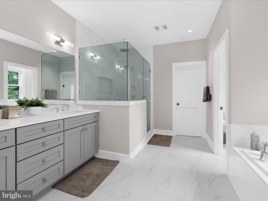 Bathroom, Dual Sink Vanities, Glass Shower, Interior, Marble, Marble Walls, Recessed Lighting