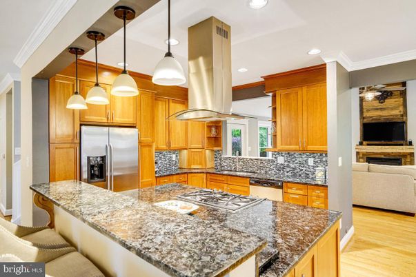 Fireplace, Interior, Kitchen, Pendant Lights, Recessed Lighting, Stainless Steel Appliances, Wood Texture Flooring