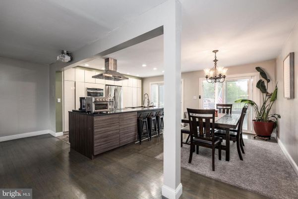 Chandelier, Dining room, Interior, Kitchen, Recessed Lighting, Stainless Steel Appliances, Wood Texture Flooring