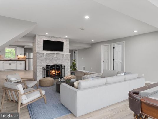 Fireplace, Interior, Living room, Recessed Lighting, Stone Walls, Wood Texture Flooring