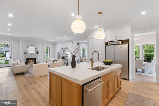 Fireplace, Interior, Kitchen, Living room, Pendant Lights, Recessed Lighting, Stainless Steel Appliances, Wood Texture Flooring