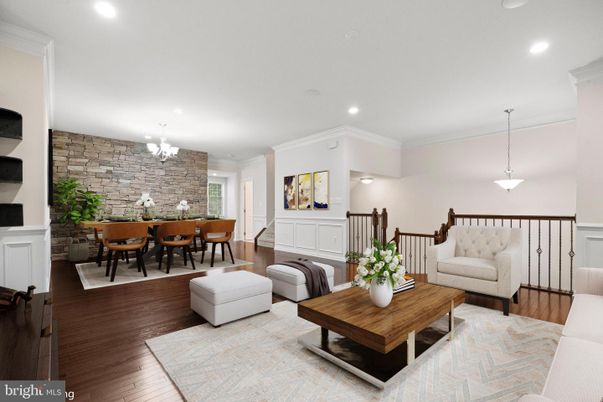 Chandelier, Dining room, Interior, Living room, Pendant Lights, Recessed Lighting, Stone Walls, Wood Texture Flooring