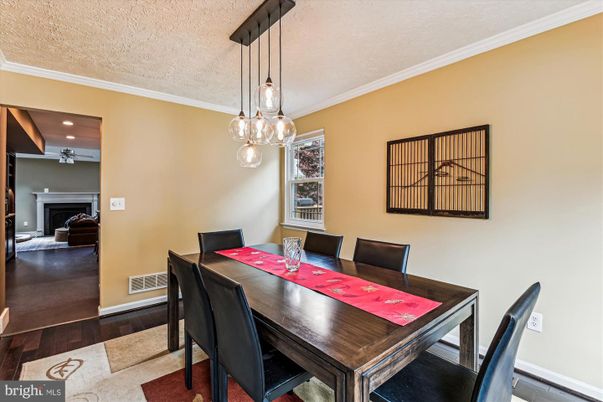 Dining room, Fireplace, Interior, Pendant Lights, Recessed Lighting, Wood Texture Flooring