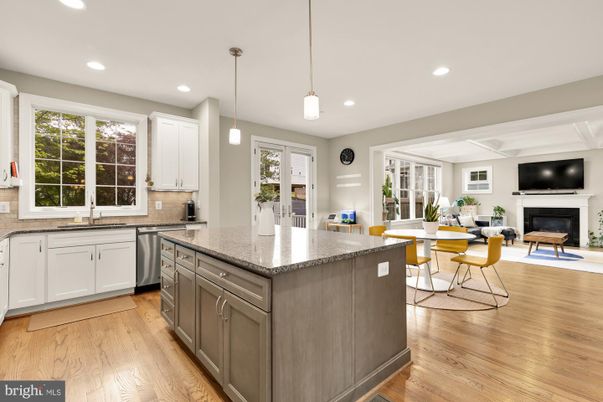 Dining room, Fireplace, Interior, Kitchen, Living room, Pendant Lights, Recessed Lighting, Stainless Steel Appliances, Wood Texture Flooring