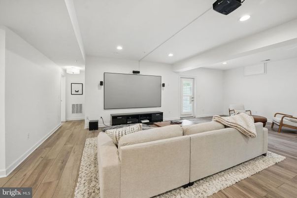 Interior, Living room, Projection Screen, Recessed Lighting, Theatre Room, Wood Texture Flooring