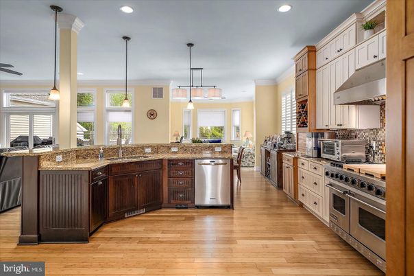 Interior, Kitchen, Pendant Lights, Recessed Lighting, Stainless Steel Appliances, Wood Texture Flooring