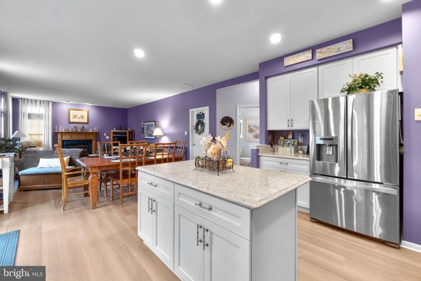 Dining room, Interior, Kitchen, Recessed Lighting, Stainless Steel Appliances, Wood Texture Flooring