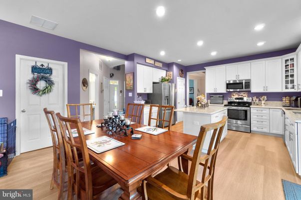 Dining room, Interior, Kitchen, Recessed Lighting, Stainless Steel Appliances, Wood Texture Flooring