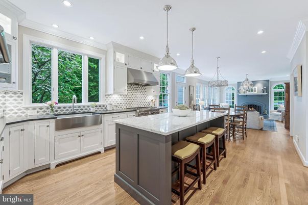 Dining room, Fireplace, Interior, Kitchen, Living room, Pendant Lights, Recessed Lighting, Stainless Steel Appliances, Wood Texture Flooring