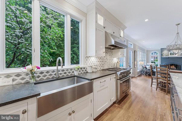 Dining room, Fireplace, Interior, Kitchen, Pendant Lights, Recessed Lighting, Stainless Steel Appliances, Wood Texture Flooring