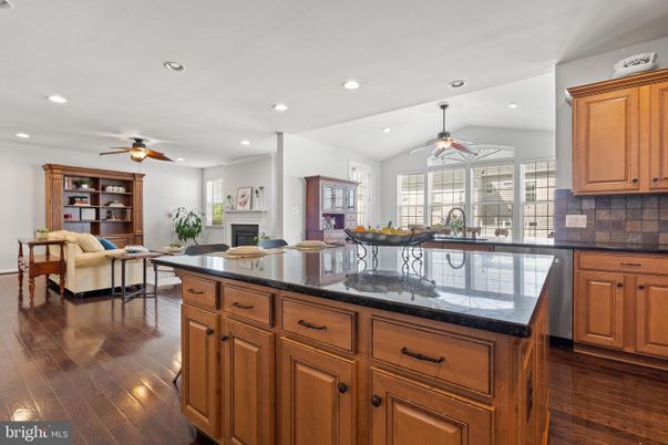 Dining room, Fireplace, Interior, Kitchen, Living room, Recessed Lighting, Wood Texture Flooring