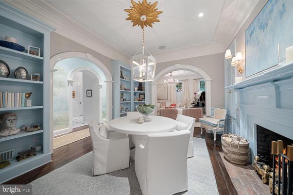 Chandelier, Dining room, Fireplace, Interior, Living room, Pendant Lights, Recessed Lighting, Wood Texture Flooring