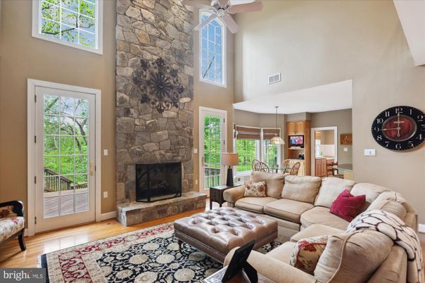 Dining room, Fireplace, Interior, Living room, Pendant Lights, Stone Walls, Wood Texture Flooring