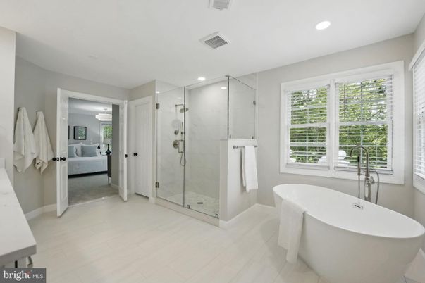 Bathroom, Free Standing Baths, Glass Shower, Interior, Marble Walls, Recessed Lighting