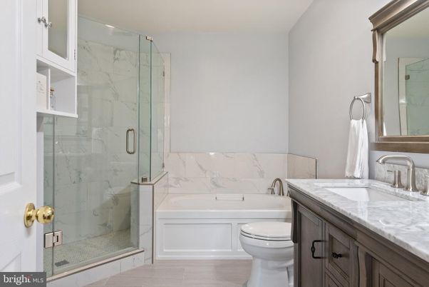 Bathroom, Glass Shower, Interior, Marble Walls, Wood Texture Flooring