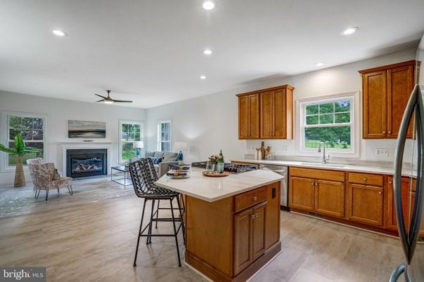 Fireplace, Interior, Kitchen, Living room, Recessed Lighting, Wood Texture Flooring