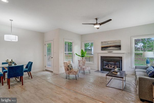 Dining room, Fireplace, Interior, Living room, Pendant Lights, Wood Texture Flooring