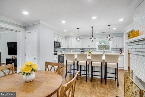 Dining room, Interior, Kitchen, Pendant Lights, Recessed Lighting, Stainless Steel Appliances, Wood Texture Flooring