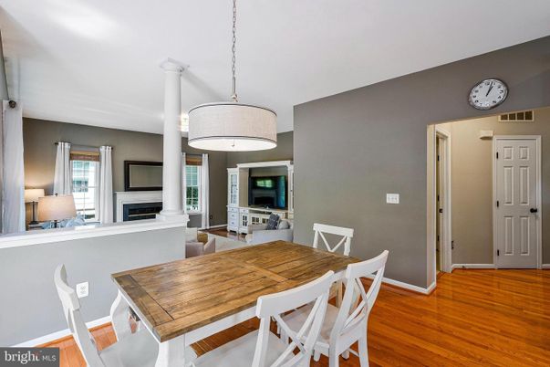 Dining room, Fireplace, Interior, Pendant Lights, Wood Texture Flooring