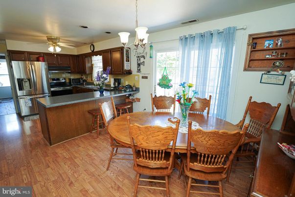 Dining room, Interior, Kitchen, Pendant Lights, Stainless Steel Appliances, Wood Texture Flooring