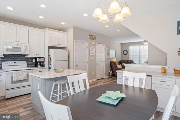 Chandelier, Dining room, Interior, Kitchen, Living room, Recessed Lighting, Wood Texture Flooring