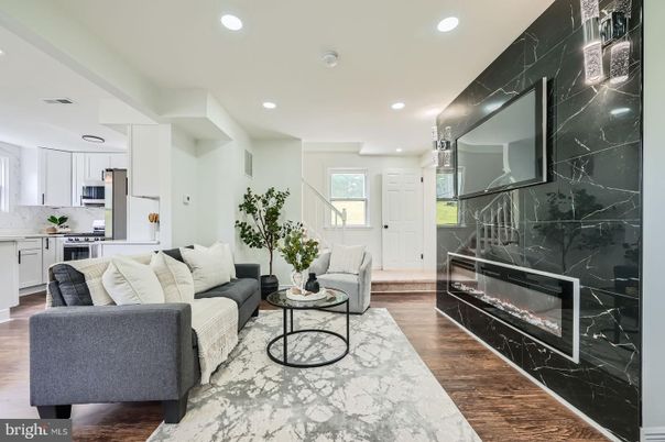 Fireplace, Interior, Kitchen, Living room, Marble Walls, Recessed Lighting, Wood Texture Flooring