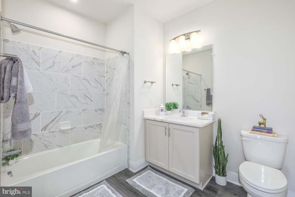 Bathroom, Interior, Marble Walls, Recessed Lighting, Wood Texture Flooring