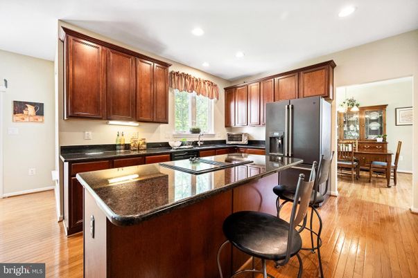 Dining room, Interior, Kitchen, Recessed Lighting, Stainless Steel Appliances, Wood Texture Flooring