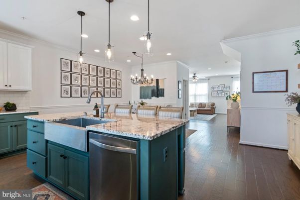 Chandelier, Interior, Kitchen, Living room, Pendant Lights, Recessed Lighting, Stainless Steel Appliances, Wood Texture Flooring