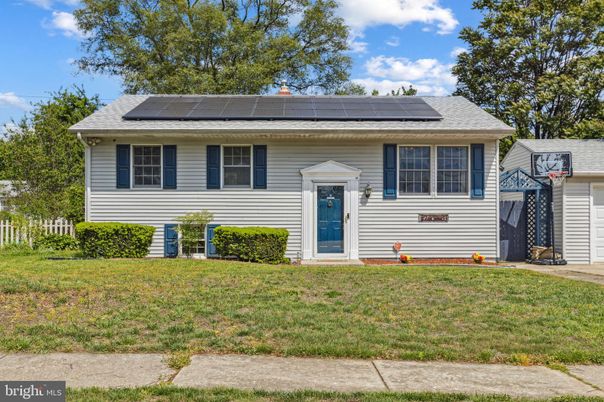 Exterior, Facade, Solar Panels, Raised Ranch