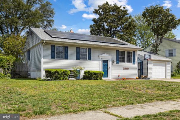 Attached, Exterior, Facade, Solar Panels, Raised Ranch