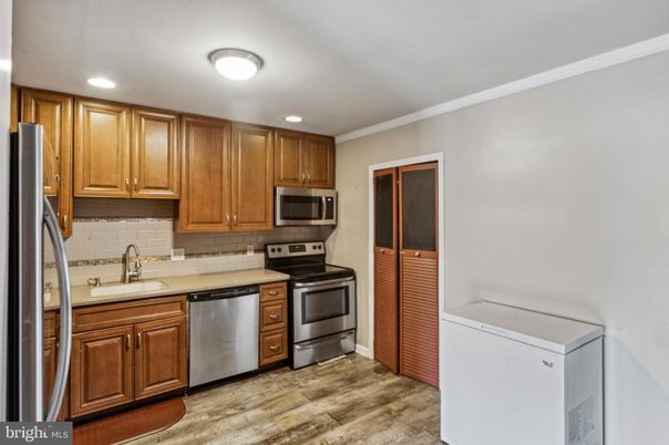 Interior, Kitchen, Recessed Lighting, Stainless Steel Appliances, Wood Texture Flooring