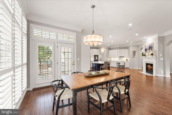Chandelier, Dining room, Fireplace, Interior, Kitchen, Pendant Lights, Recessed Lighting, Wood Texture Flooring
