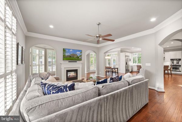 Dining room, Fireplace, Interior, Living room, Recessed Lighting, Wood Texture Flooring