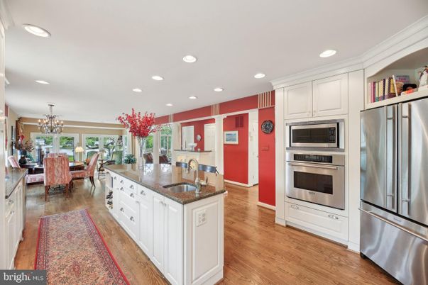 Chandelier, Dining room, Interior, Kitchen, Recessed Lighting, Stainless Steel Appliances, Wood Texture Flooring