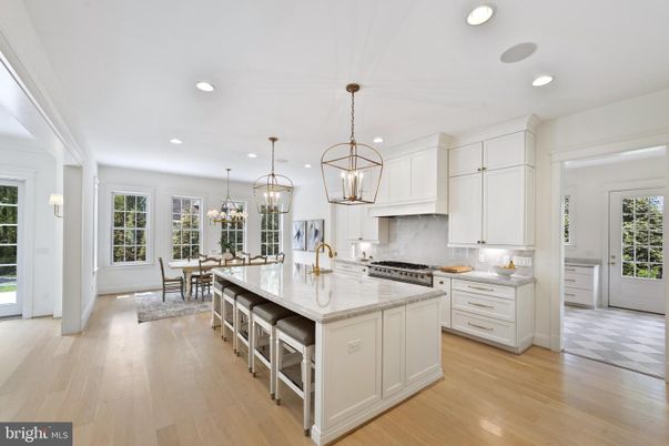 Chandelier, Dining room, Interior, Kitchen, Pendant Lights, Recessed Lighting, Stainless Steel Appliances, Wood Texture Flooring